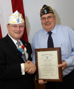 Dept. Commander Ken Governor presents Award of Excellence to Charles West. Photo by Doug Malin.