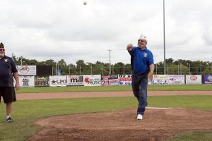 Commander throws first pitch
